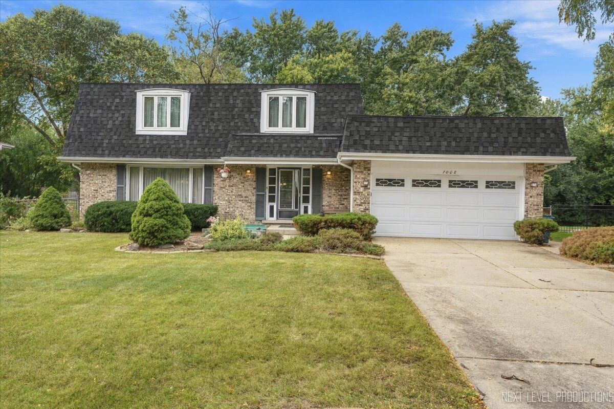 Property Photo:  7008 Blackburn Avenue  IL 60516 