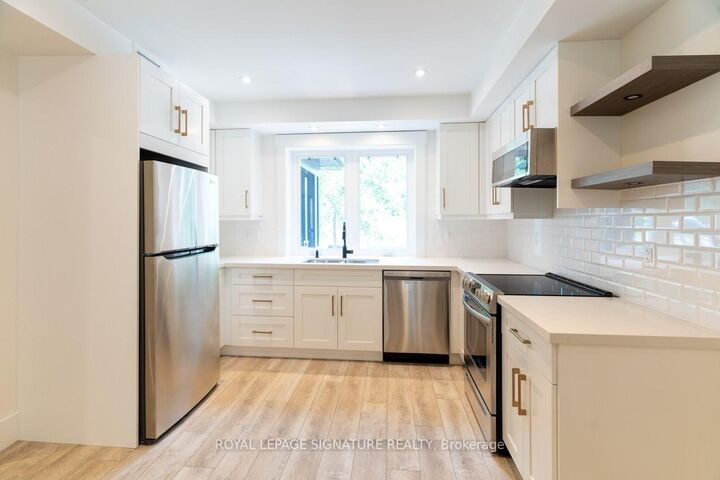 Property Photo:  129 Kenilworth Avenue Main  ON M4L 3S7 