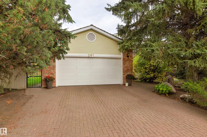 Property Photo:  201 Rhatigan Road NW  AB T6R 1A2 