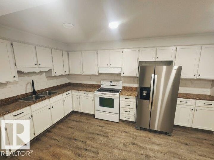 Property Photo:  12707 85 Street NW NW B  AB T5E 2Y6 