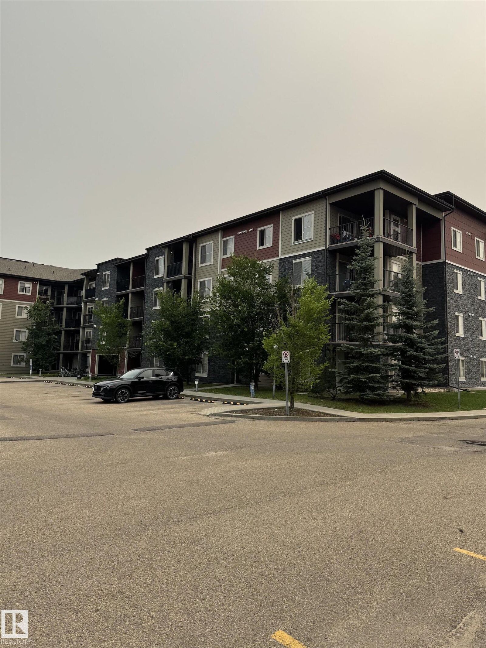 Property Photo:  303 James Mowatt Trail SW  AB T6W 3L6 
