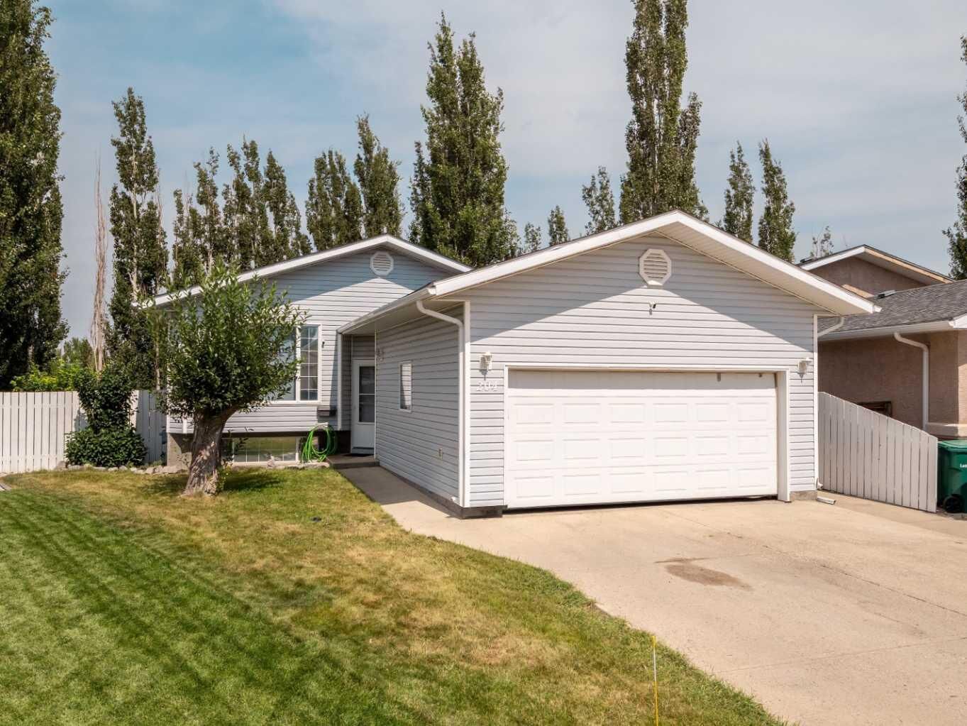 Property Photo:  204 Mt Rundle Road W  AB T1K 7E9 