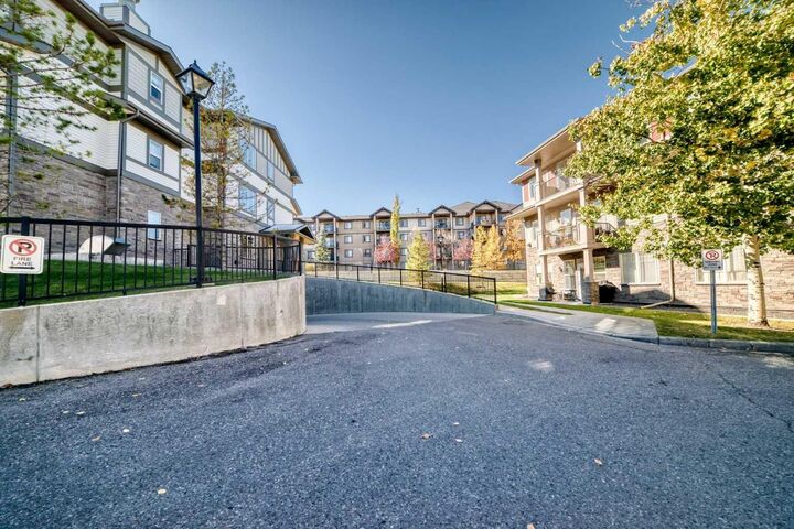 Property Photo:  76 Panatella Road NW 106  AB T3K 0V4 