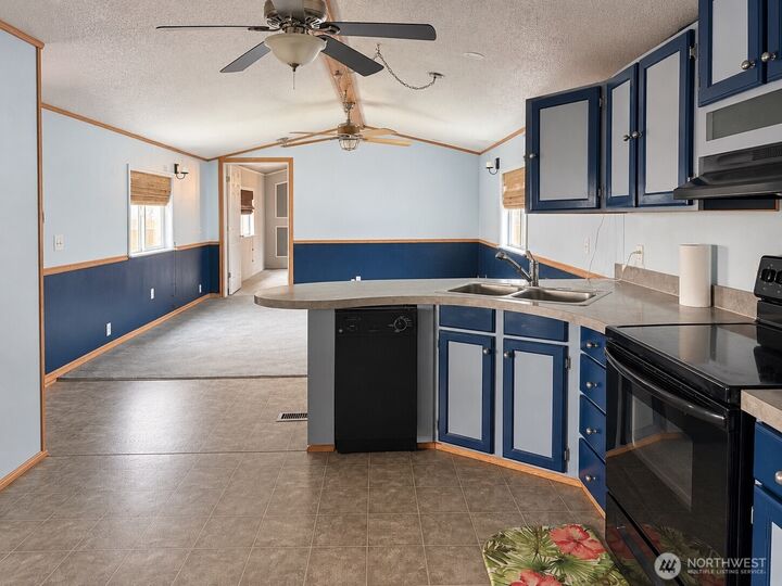 Property Photo: 2110 Trosper Road SW 13 WA 98512