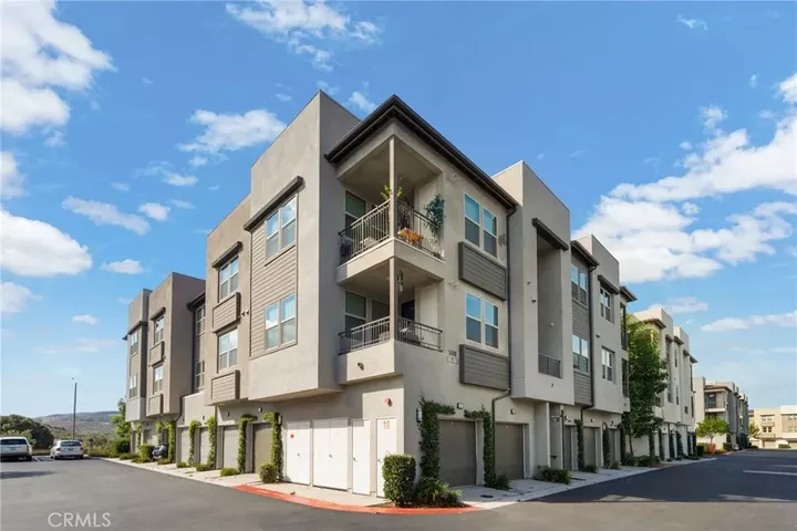 Property Photo:  1300 Lasso 203  CA 92694 