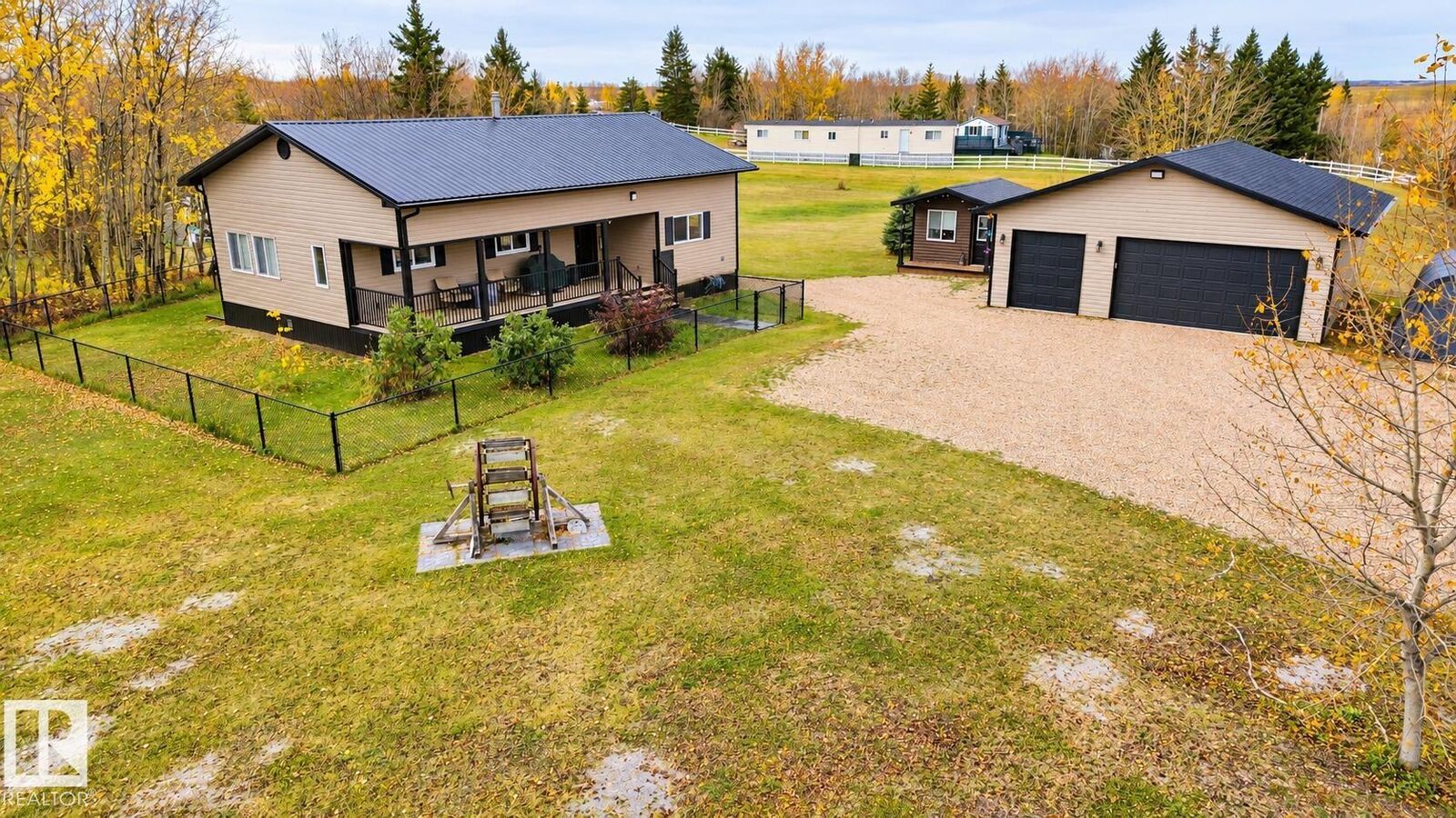 Property Photo:  225 & 227 57201 Range Road 102  AB T0A 3A0 