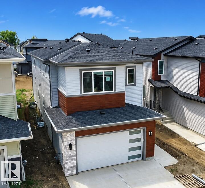 Property Photo: 8916 Mayday Wy SW AB T6X 3E9
