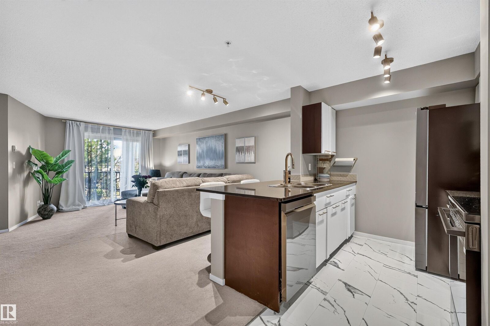 Property Photo:  3207 James Mowatt Trail SW 217  AB T6W 3L6 
