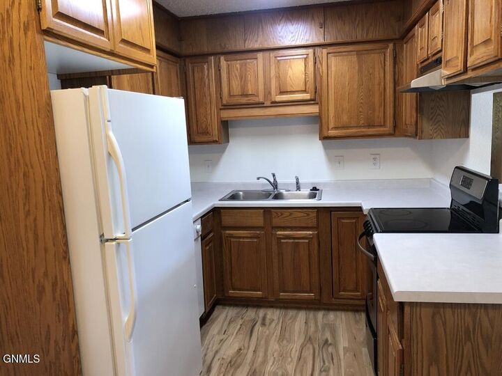 Property Photo:  151 Boise Avenue 5  ND 58504 