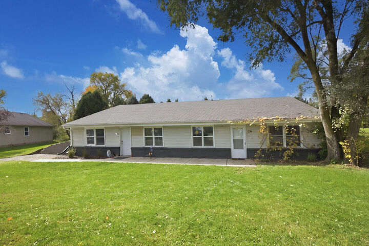 Property Photo:  1043-1045 Carriage Ct  WI 53156 