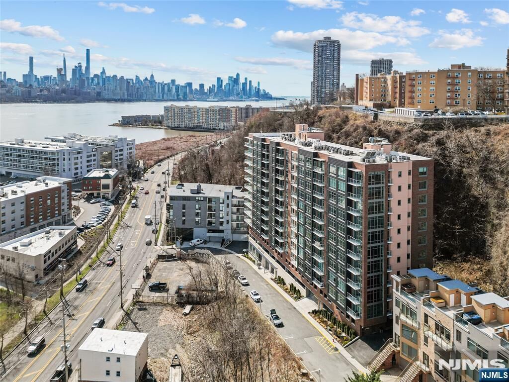 Property Photo:  8701 Churchill Road Ph1501  NJ 07047 
