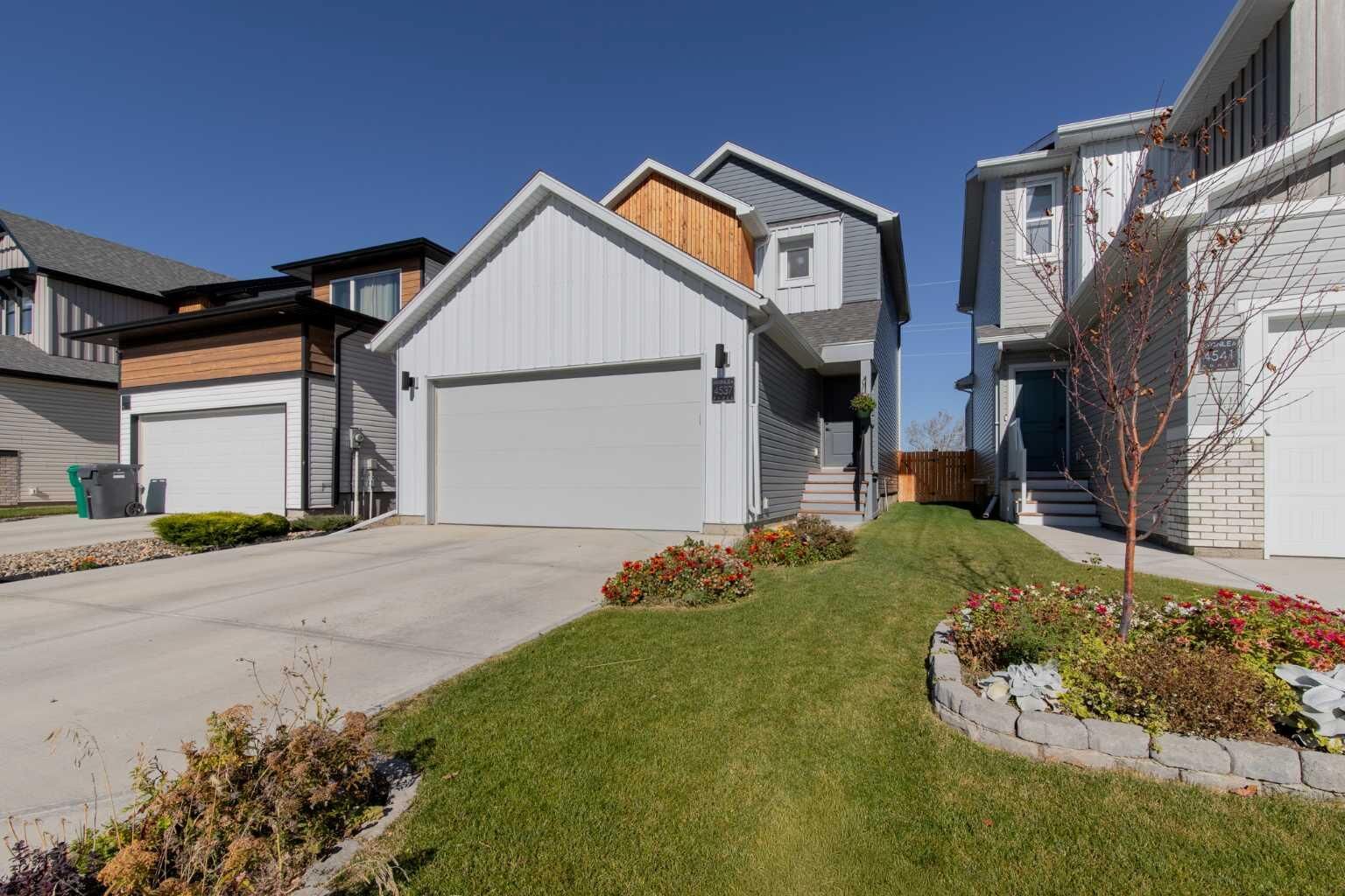 Property Photo:  4537 25 Avenue S  AB T1K 8K5 