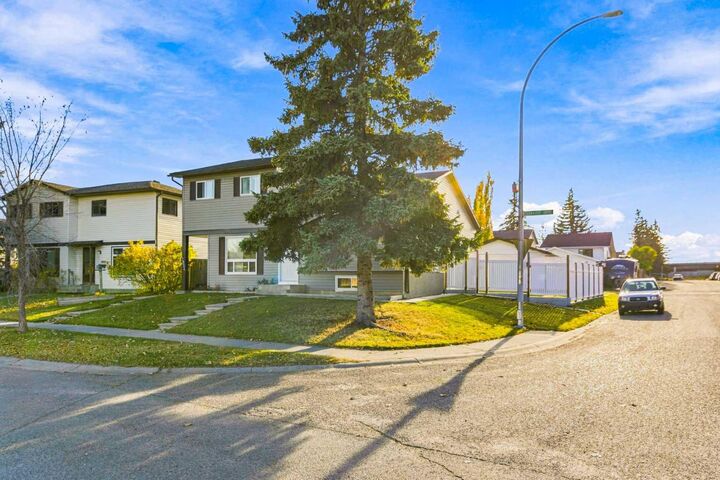 Property Photo: 3602 Cedarille Drive SW AB T2W 5B2