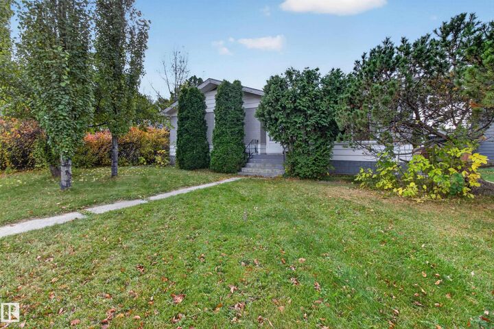 Property Photo:  6321 104 Avenue NW  AB T6A 0X9 