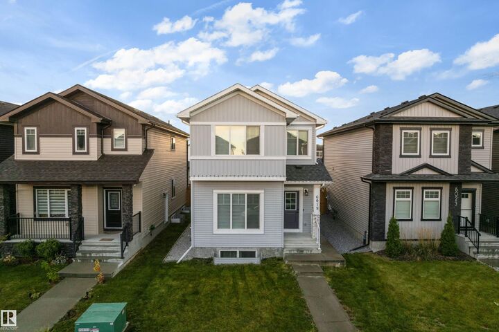 Property Photo:  6019 180 Avenue NW  AB T5Y 3W9 