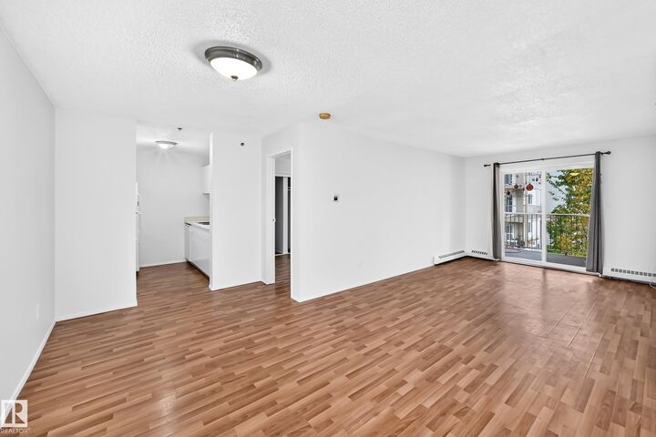 Property Photo: 11218 80 Street NW 212 AB T5B 4V9