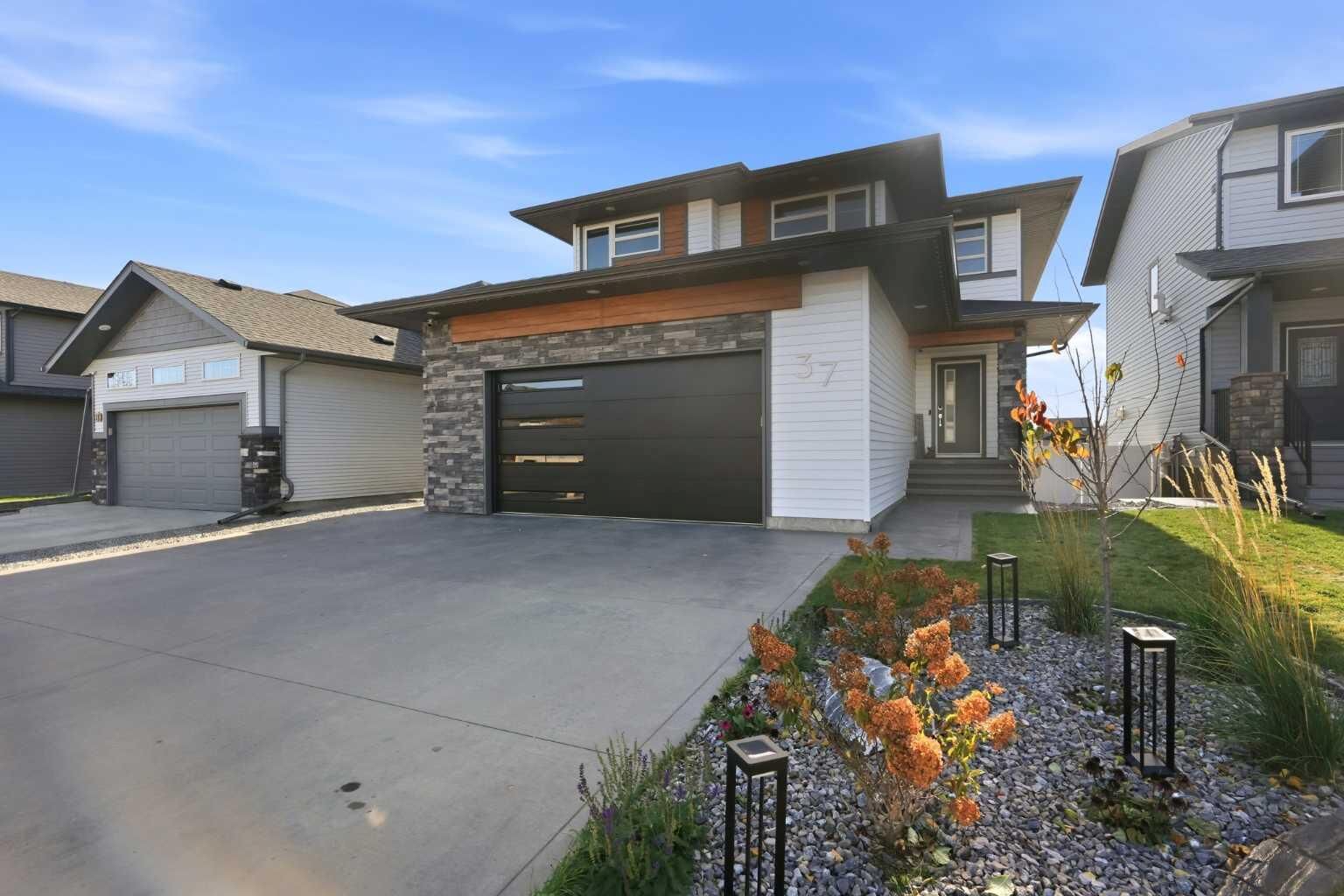 Property Photo:  37 Tanner Street  AB T4P 0S7 