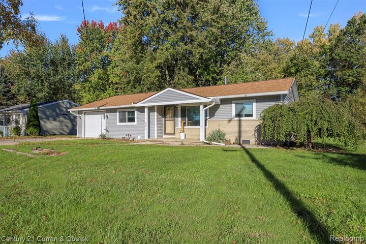 Property Photo:  201 W Peterson Drive  MI 48114 