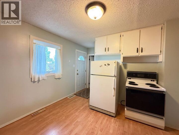 Property Photo:  308 3 Street North  AB T0B 2X0 
