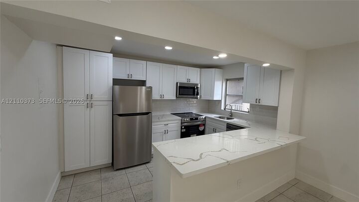 Property Photo:  7727 SW 86th St A1-308  FL 33143 
