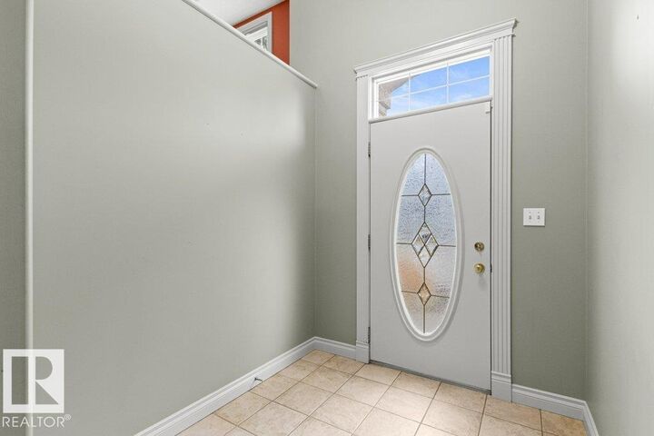 Property Photo:  11686 15 Avenue NW  AB T6J 7E1 