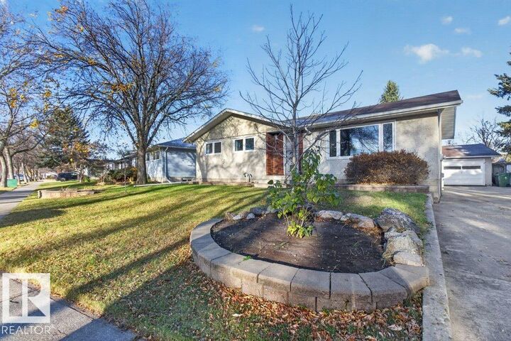 Property Photo:  9120 92 Avenue  AB T8L 1A7 