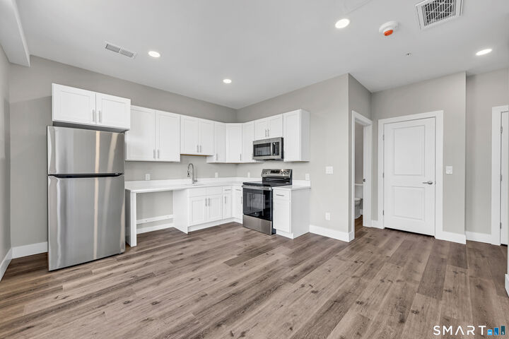 Property Photo:  1 West Main Street 4F  CT 06451 