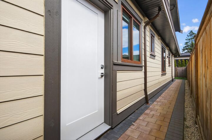 Property Photo:  7588 Armstrong Street Ground  BC V6Y 2S6 