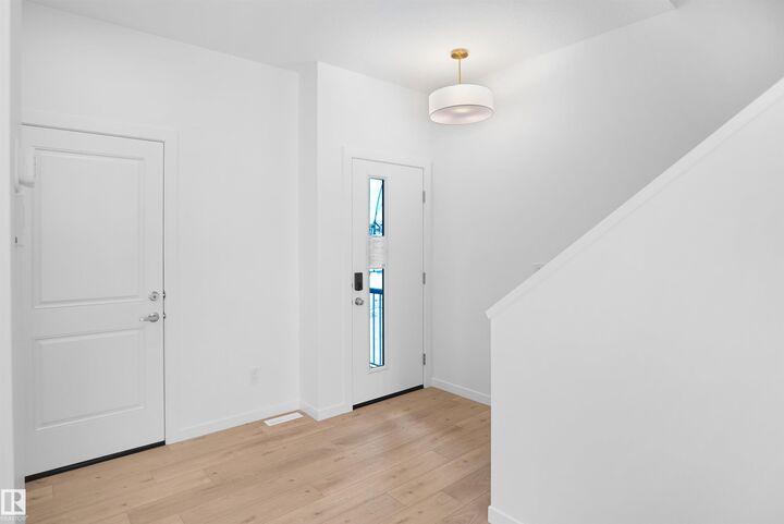 Property Photo:  20917 24 Avenue NW  AB T6T 2N8 