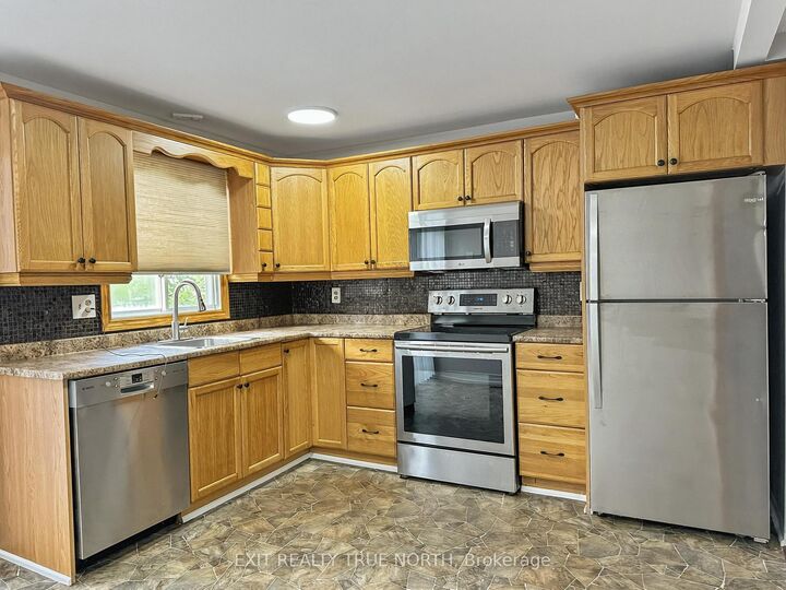 Property Photo:  71 Hickling Trail  ON L4M 5S7 