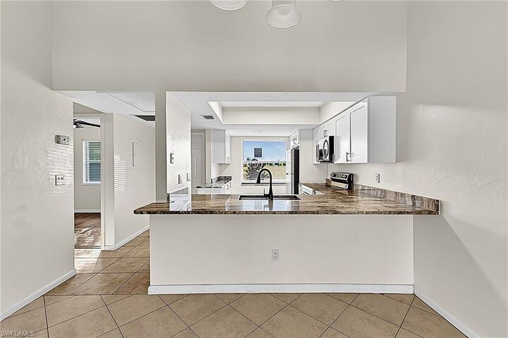 Property Photo:  3739 SW 9th Ave 113  FL 33914 