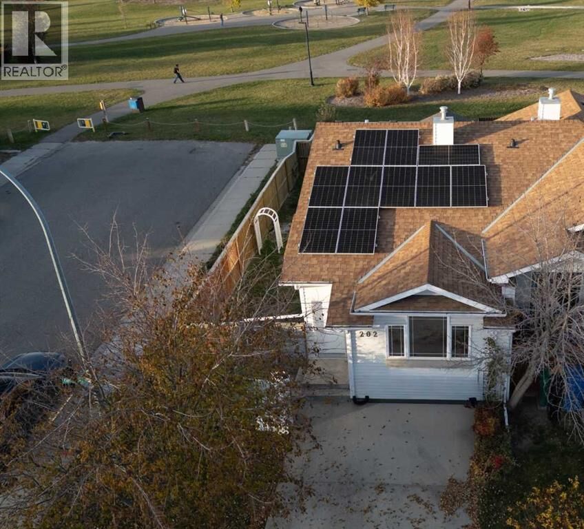 Property Photo:  202 Cougar Way North  AB T1H 6P4 