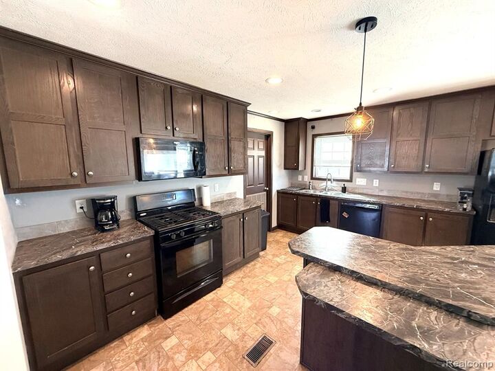 Property Photo: 9784 Birmingham Street MI 48430