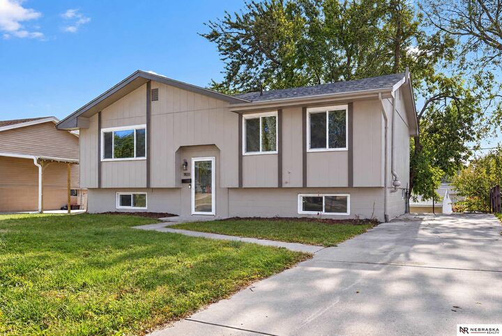 Property Photo: 7611 Teal Street NE 68128