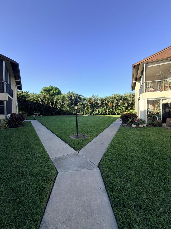 Property Photo:  5773 La Pinata Boulevard C-1  FL 33463 