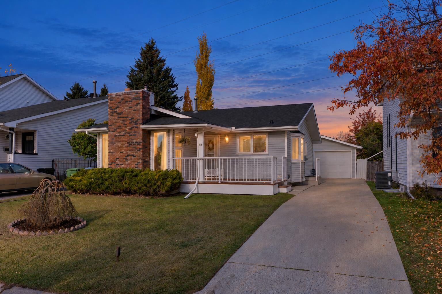 Property Photo:  48 Strathclair Rise SW  AB T3H 1G4 
