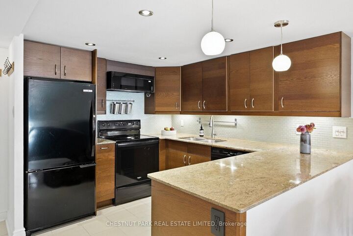 Property Photo: 65 Scadding Avenue 211 ON M5A 4L1