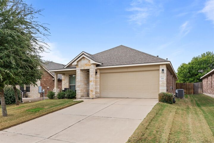 Property Photo:  709 Schefer Street  TX 78641 