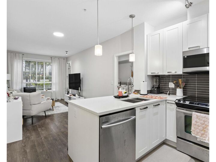 Property Photo: 10477 154 Street 102 BC V3R 0C6