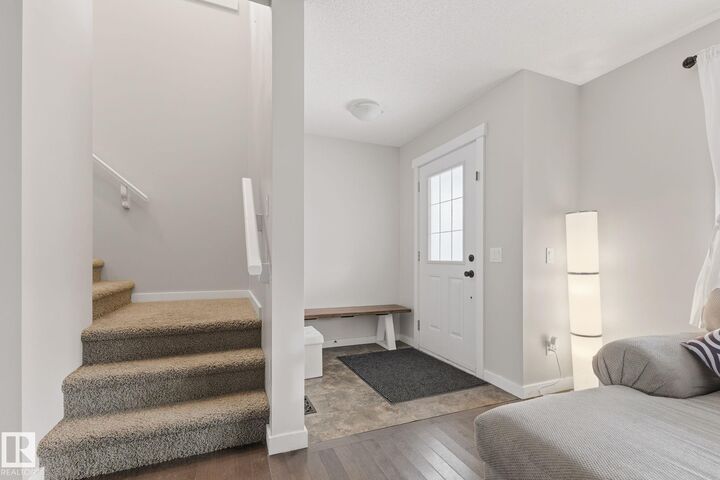 Property Photo:  5130 1B Avenue SW  AB T6X 0Z7 
