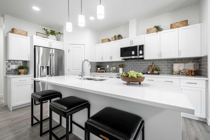 Property Photo: 308 Heritage Boulevard AB T4C 3K6