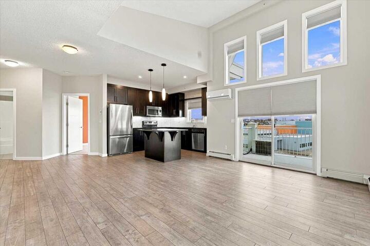 Property Photo:  402 Marquis Lane SE 420  AB T3M 2G7 