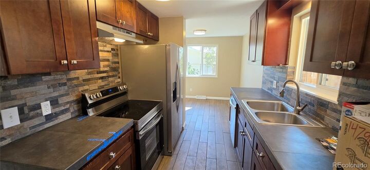 Property Photo:  6335 Dudley Street 6339  CO 80004 