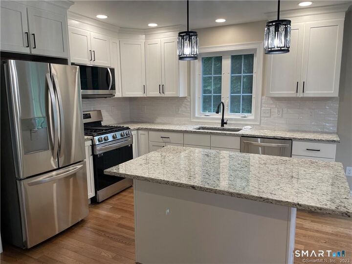 Property Photo:  12 Sleepy Hollow Pentway  CT 06335 
