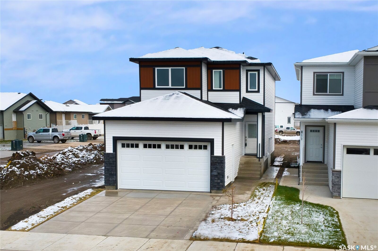 Property Photo:  807 Brighton Boulevard  SK S7V 1X8 