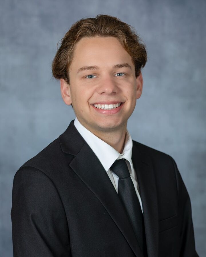 Dayton Goralski, Real Estate Salesperson in Schofield, Action