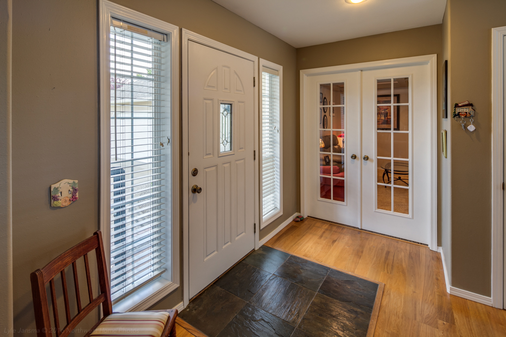 Property Photo: The entry is very welcoming, with the slate tile defining the area. the french doors lead to the office or tv room. 537 Sunrise Dr  WA 98264 