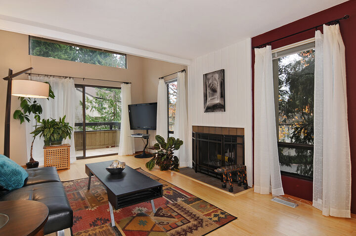 Property Photo: Living room, dining room, kitchen 3501 108th Place NE 43-1 WA 98004